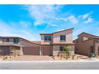 Charming two-story home featuring desert landscaping and a convenient three-car garage at 9314 Observatory St, Las Vegas, NV 89143