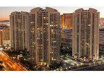 Striking view of the high-rise buildings with illuminated windows at dusk, creating a vibrant city scene at 2777 Paradise Rd # 1505, Las Vegas, NV 89109