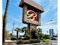 Bella Vita community sign with lush landscaping welcomes residents and visitors at 4421 Alexis Dr # 429, Las Vegas, NV 89103
