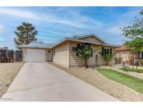 Charming single-story home with a driveway, a one-car garage and desert landscaping at 4739 Glenndavis Dr, Las Vegas, NV 89121