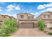 Charming two-story home with brick driveway and well-maintained landscaping at 872 Pointe Arbor St, Henderson, NV 89011