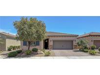 Charming single-story home with a two-car garage, desert landscaping and inviting curb appeal at 1120 Via Della Curia, Henderson, NV 89011