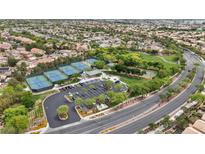 Beautiful aerial view of community park with tennis and basketball courts in a residential neighborhood at 10952 Napa Ridge Dr, Las Vegas, NV 89144