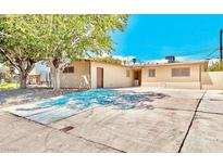 Charming single-story home with mature trees and a spacious driveway at 6320 Shawnee Ave, Las Vegas, NV 89107