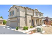 Inviting two-story home featuring low-maintenance landscaping and a two-car garage at 7868 Territorial St, Las Vegas, NV 89149