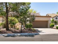 Charming single-story home featuring a well-manicured lawn and a two-car garage at 9329 January Dr, Las Vegas, NV 89134