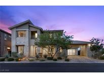 Charming two-story home with professionally landscaped front yard and covered garage at 2890 Reverence Heights Ln, Las Vegas, NV 89138