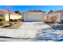 Charming single-story home with a well-maintained front yard and a two-car garage at 3372 Wayward Ct, Las Vegas, NV 89129