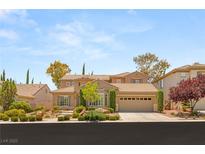Charming single-Gathering home featuring a well-manicured lawn and a spacious two-car garage at 3535 Coventry Gardens Dr, Las Vegas, NV 89135