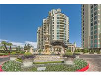 Luxury high-rise residence featuring meticulously landscaped grounds and elegant fountain, offering an upscale living experience at 9101 Alta Dr # 1203, Las Vegas, NV 89145