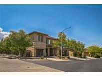 Beautiful two-story home with a well-maintained yard and three-car garage at 10373 Hawk Ravine St, Las Vegas, NV 89178