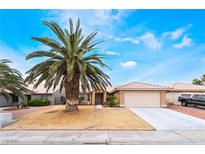Charming single-story home with desert landscaping and a spacious two-car garage at 4719 Sparta Way, North Las Vegas, NV 89032