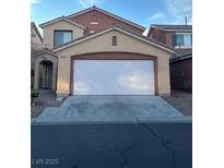 Charming two-story home with a two car garage and neutral paint colors at 5591 La Perla Ct, Las Vegas, NV 89122
