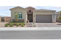 Charming single-Gathering home featuring a two-car garage and well-manicured front yard at 8668 Hartmont St, Las Vegas, NV 89166