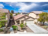 Charming single-story home features a well-maintained yard and inviting curb appeal at 11091 Parete Ct, Las Vegas, NV 89141