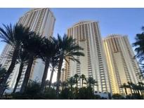 Luxury high rise condo building featuring lush landscaping and expansive architecture at 145 E Harmon Ave # 27621, Las Vegas, NV 89109