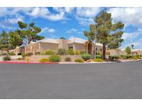 Charming single-story home features a well-maintained front yard and desert landscaping at 471 Fallwood Ln, Las Vegas, NV 89107