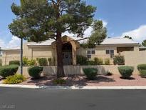 Charming single-story home with desert landscaping and a beige exterior paint at 471 Fallwood Ln, Las Vegas, NV 89107