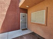 Inviting front door with security gate, covered entry and welcome mat at 4730 E Craig Rd # 1155, Las Vegas, NV 89115