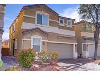 Inviting two-story home featuring desert landscaping and an attached two-car garage at 9535 Stills Way, Las Vegas, NV 89148