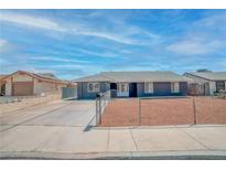 Charming single-story home with well-maintained landscaping and a spacious driveway at 4425 Sherrill Ave, Las Vegas, NV 89110