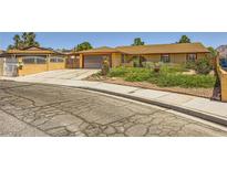 Charming single-story home with a well-maintained front yard and inviting curb appeal at 1950 Abarth St, Las Vegas, NV 89142
