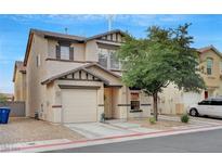 Charming two-story home features a one car garage and low maintenance landscaping at 622 Quaint Acres Ave, Las Vegas, NV 89183