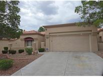 Charming single-story home featuring desert landscaping and a spacious two-car garage at 9329 Fresh Spring Dr, Las Vegas, NV 89134