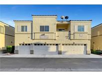 Multi-Gathering unit displaying a Spanish style, a stucco exterior, and private garage parking at 6170 E Sahara Ave # 1061, Las Vegas, NV 89142