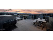 Enjoy the sunset on this rooftop deck with a grill, seating, and city views at 8113 Misty Canyon Ave, Las Vegas, NV 89113