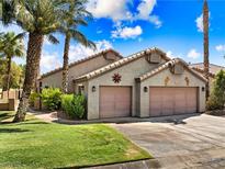 Charming home with a two-car garage and well-maintained landscaping in a beautiful neighborhood at 1131 Golf Club, Laughlin, NV 89029