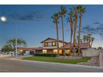 Charming two-story home featuring desert landscaping and a red tile roof at 1251 Los Meadows Dr, Las Vegas, NV 89110