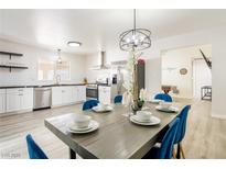 Bright dining area showcases stylish table setting and modern lighting near the kitchen at 4471 Wisconsin Ave, Las Vegas, NV 89104
