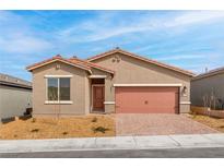 Charming single-story home with a well-manicured yard and appealing desert landscaping at 2727 Avril Point St, Las Vegas, NV 89156