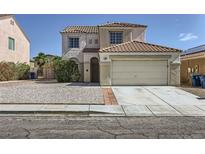Charming two-story home with a two car garage and desert landscaping at 7382 Elbridge Way, Las Vegas, NV 89113