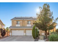 Charming two-story home featuring a paved driveway and solar panels for energy efficiency at 7221 Harlow St, Las Vegas, NV 89131