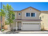 Beautiful two-story home with a two-car garage and well-maintained landscaping at 7249 Linaria Rd, Las Vegas, NV 89113