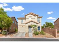 Charming two-story home featuring a well-maintained front yard and a neutral color palette at 8336 Golden Amber St, Las Vegas, NV 89139