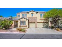 Charming two-story home with stone accents, neutral color palette, manicured landscaping, and a three-car garage at 8029 Flambeau St, Las Vegas, NV 89131
