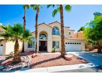 Charming two-story home with well-maintained landscaping and a welcoming front entrance at 9413 Cedar Heights Ave, Las Vegas, NV 89134