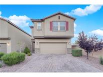 Charming two-story home featuring desert landscaping and a two-car garage at 5503 Jinan St, Las Vegas, NV 89148