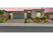 Charming single-story home with manicured landscaping and a neutral color scheme, enhancing curb appeal at 6865 Steel Mist St, Las Vegas, NV 89148