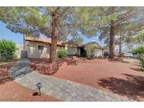 Charming single-story home with mature trees and well-maintained landscaping in a desirable neighborhood at 872 N Linn Ln, Las Vegas, NV 89110