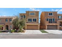 Charming two-story home with a two-car garage, desert landscaping, and neutral exterior paint at 6019 Sonoma Station Ave, Las Vegas, NV 89139