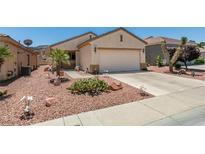 Charming single-story home with a well-maintained front yard and desert landscaping at 1793 Eagle Village Ave, Henderson, NV 89012