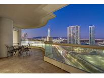 Enjoy the cityscape from this condo's spacious balcony with room for seating and panoramic views at 2777 Paradise Rd # 2001, Las Vegas, NV 89109