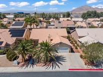 Charming single story home with desert landscaping and an attached two car garage at 6292 Belgium Dr, Las Vegas, NV 89122