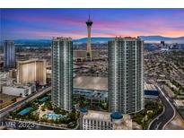 Stunning aerial view of Las Vegas condos, the Strip and the surrounding cityscape at sunset at 322 Karen Ave # 601, Las Vegas, NV 89109