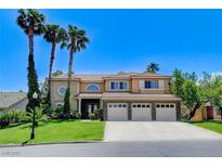 Charming two-story home features a three-car garage, desert landscaping, and stucco finish at 8113 Gothic Ave, Las Vegas, NV 89117