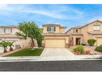 Charming two-story home with a well-manicured front yard and inviting curb appeal at 8221 Stoneheather Ct, Las Vegas, NV 89117